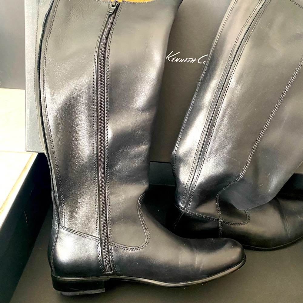 Gently used Kenneth Cole knee high boot. Comfortably fits an 14’ calf.